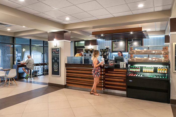 Woman Talking to Barista