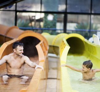 Compass Cove Dad and Son on Waterslide