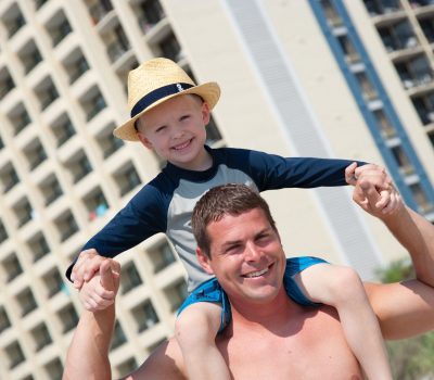 Smiling family on the beach